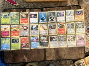 Lot of 54 Pokemon trading cards including Feebas, Lileep, Meowth and More