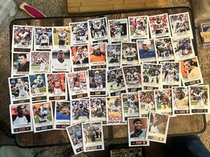 Lot of Football Cards Featuring Players like Johnny Manziel, Ryan Tannehill, and Brandon Cooks - Includes Rookie Cards and Team Variants
