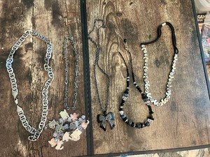 Fashion jewelry necklaces collection including various styles and materials