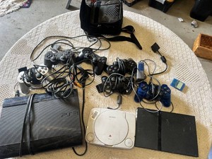 Sony PlayStation 3 and PlayStation 2 Gaming Consoles with Controllers and Accessories