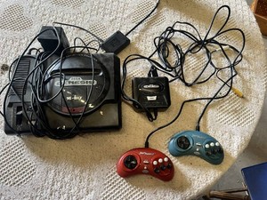 Sega Genesis Console with Controllers and Sonic the Hedgehog Game