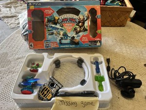 Skylanders Trap Team Starter Pack for PS4, including portal, figures, and accessories (missing game) and PlayStation camera