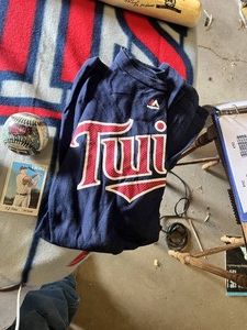 Minnesota Twins Memorabilia Collection including Baseball Bats, Balls, Program, and More