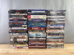 80 DVD Collection - The Thief Lord, Where the Wild Things Are, Basic Instinct, Remember the Titans, Zombieland, NipTuck, Van Helsing, Juno, Legendary Bulls, Red Dragon, WWII Collection, Airborne, Smokin Aces, Star Trek, Its a Wonderful Life, Etc. C