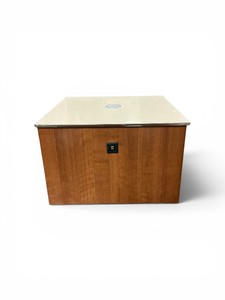 Power Box Table features induction charger and power outlets