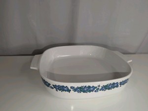 Vintage Corning Ware casserole dish in the "Evening Song" pattern, no lid