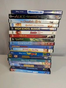 Collection of Disney and family-friendly DVDs, including popular titles like Monsters, Inc., Toy Story 3, and The Lion King 2 Simbas Pride