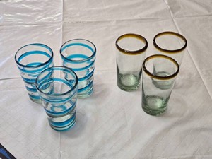Set of Drinking Glasses Including Blue Striped and Amber-Rimmed Designs