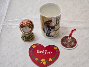 Christmas D�cor Items including God Jul Heart Decoration, Porcelain Mug with Illustration, and Decorative Clock