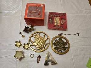 Set of Brass Holiday Decorations including Candle Holders, Musical Instrument Ornaments, and Pineapple Wall Art