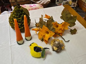 Assorted Home Decor Items including Bath & Body Works Squirrel Figurine, Gnome Candles and Audubon American Goldfinch Plush