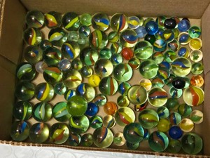 Box of Assorted Glass Marbles including Swirl Designs, Solid Colors, and Cats Eye Patterns