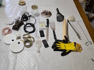 Assorted Kitchen and Household Items including Kitchen Tools, Extension Cords, and Gloves