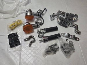 Set of Motorcycle Accessories including Foot Pegs and Turn Signals, Chrome Finish