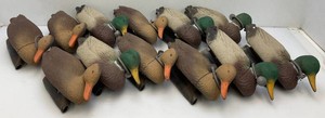 One Dozen Flambeau Mallard Duck Decoys 6 Female 6 Male In Mesh Camo Carry Bag (All But Two Have Strings And Weights)