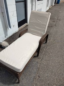 Outdoor resin wicker chaise lounge with adjustable backing and weather-resistant cushions,