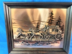 This is a vintage 1970s framed 3D copper relief art piece depicting a U.S. Mail stagecoach, signed by artist John Louw