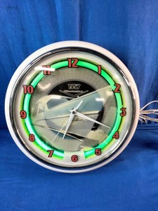 Neonetics 1957 Chevrolet neon clock with a chrome finish and hand-blown glass neon ring.