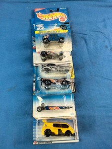Collection of vintage carded Hot Wheels die-cast toy cars, primarily from the mid-to-late 1990s.
