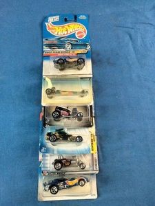Assortment of vintage sealed Hot Wheels die-cast cars from the late 1990s and early 2000s,