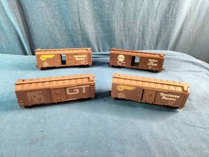 These are vintage Athearn HO scale model train boxcars