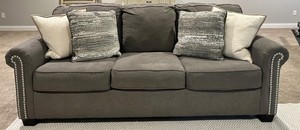Ashley 3-Cushion Gray Sofa With Nailhead Trim - Matches Lot 21