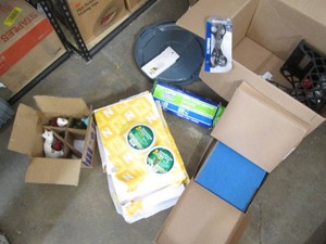 Box of office supplies, foil tape r...
