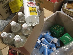 Box of water, tonic water and Olipo...