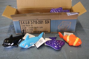 Case of 12 Wind Up Sea Animals...