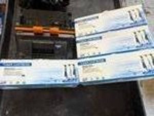 Complete set of B C M Y toner cartridges, unused