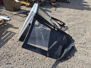 Soft sided tractor cab with hard top