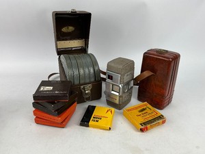Vintage Revere Reel to Reel Movie Camera wCaringing Case  Home Movies and Empty Canisters in Metal Box