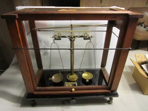 Apothecary scale with brass weights...