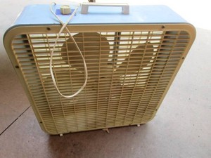 Box fan, K-Mart, grid on one side i...