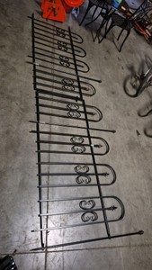 ornate garden metal fence with gate