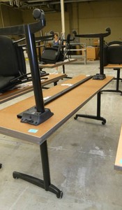 Two 72x24 Flip-top table on wheels