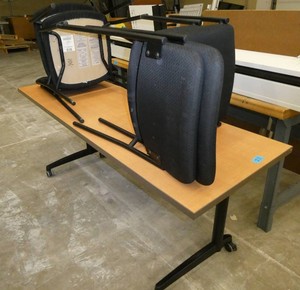One 72x24 Flip-top table on wheels and 4 chairs
