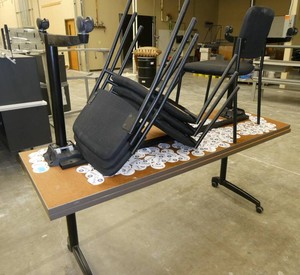 Two 72x24 Flip-top table on wheels and 4 chairs