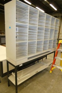 Large mail sorting station 71 wide x 16 deep x 75tall, adjustable shelves