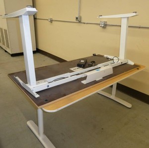 Two electric adjustable height tablesdesks