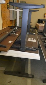 Two Steelcase electric adjustable height tablesdesks