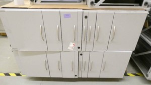 Four file cabinets (top is open)