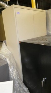 One steel storage cabinets 36 wide 18 deep 66 high - tan