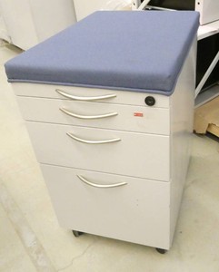 4 mobile pedestals with blue cushion top