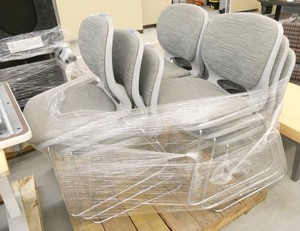 9 grey chairs, plastic with padded seat and back