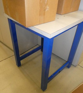 Table and 2 boxes of books in hebrew