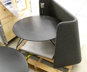 Two Herman Miller round tables 32 inch diameter, and a table top sound barrier