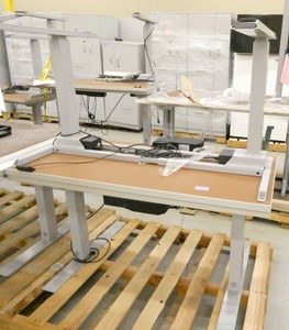 Two height adjustable tables 24x48