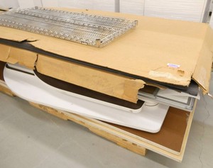 Pallet of whiteboards, table tops, shelving etc