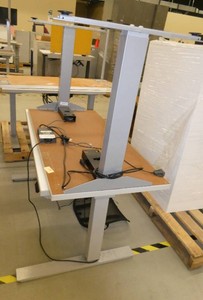 Two 24x48 adjustable height tables
